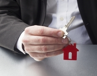 door key with red house shaped fob