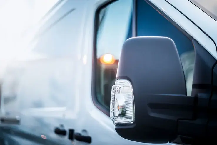 Side view of white van