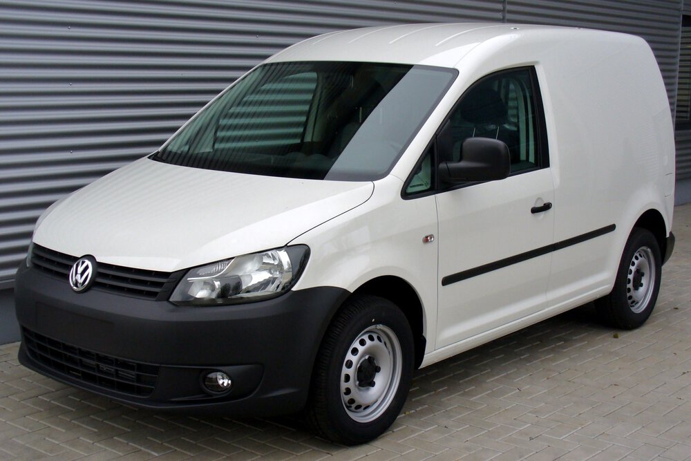 A Volkswagen Caddy van in white