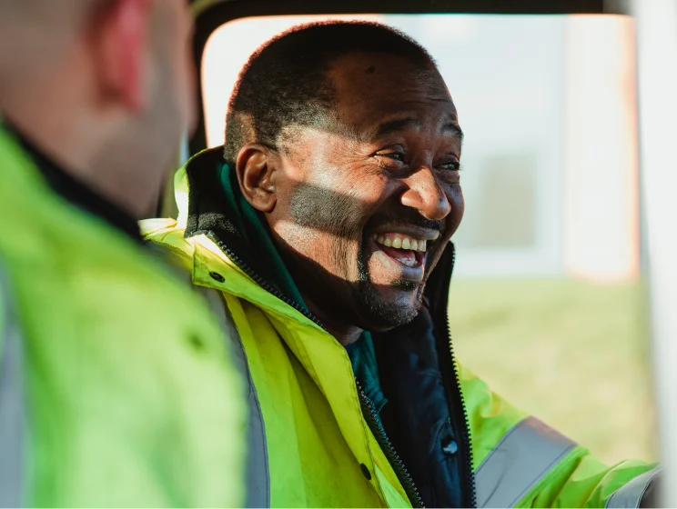 a smiling van driver