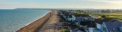 Aerial view of coastal holiday homes.