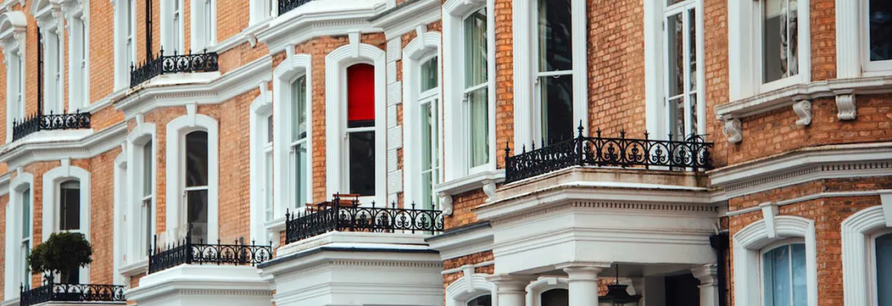 A street view of Victorian flats.